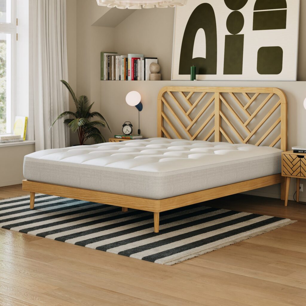 Surmatelas housse Nuage Slome posé sur un lit dans une chambre