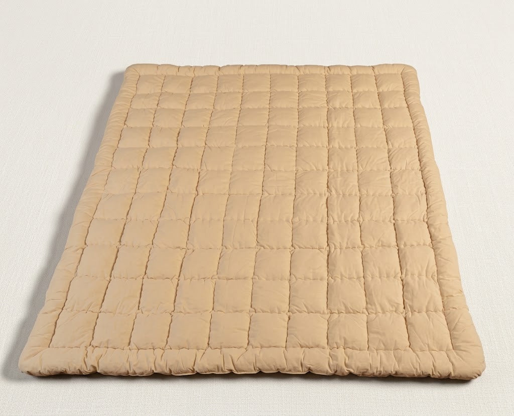 Surmatelas Sampur Fjord installe sur un lit