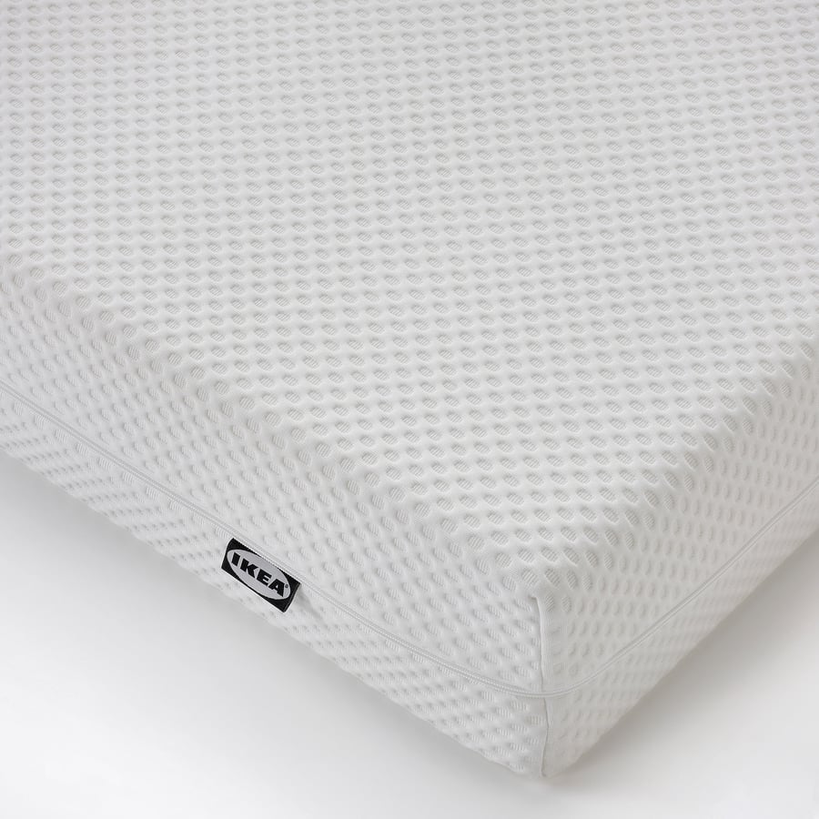 Matelas IKEA ÅBYGDA, gros plan sur la housse tricotée blanche