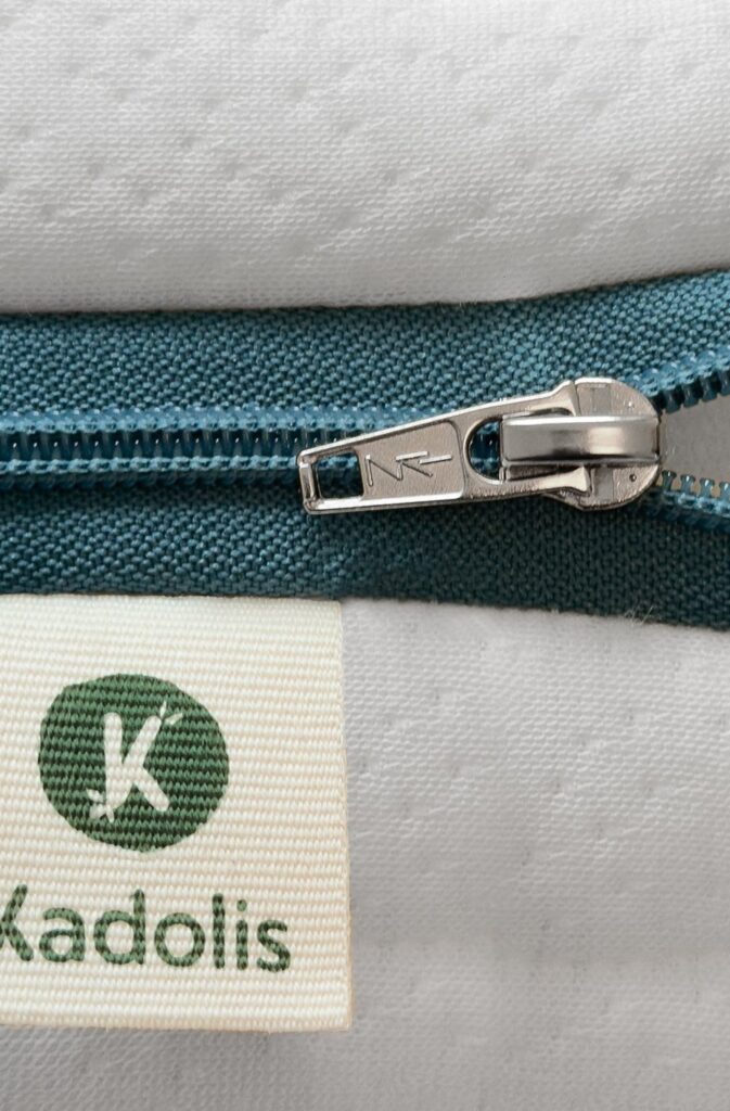 Kadolis Cocolegend Bébé, fermeture éclair et étiquette de la housse