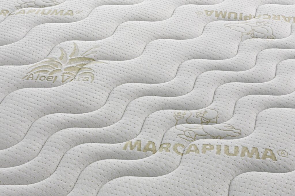 Gros plan du tissu matelassé du Marcapiuma Sevenlife 18