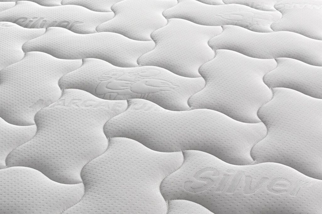 Gros plan du tissu matelassé du Marcapiuma Sevenlife 20