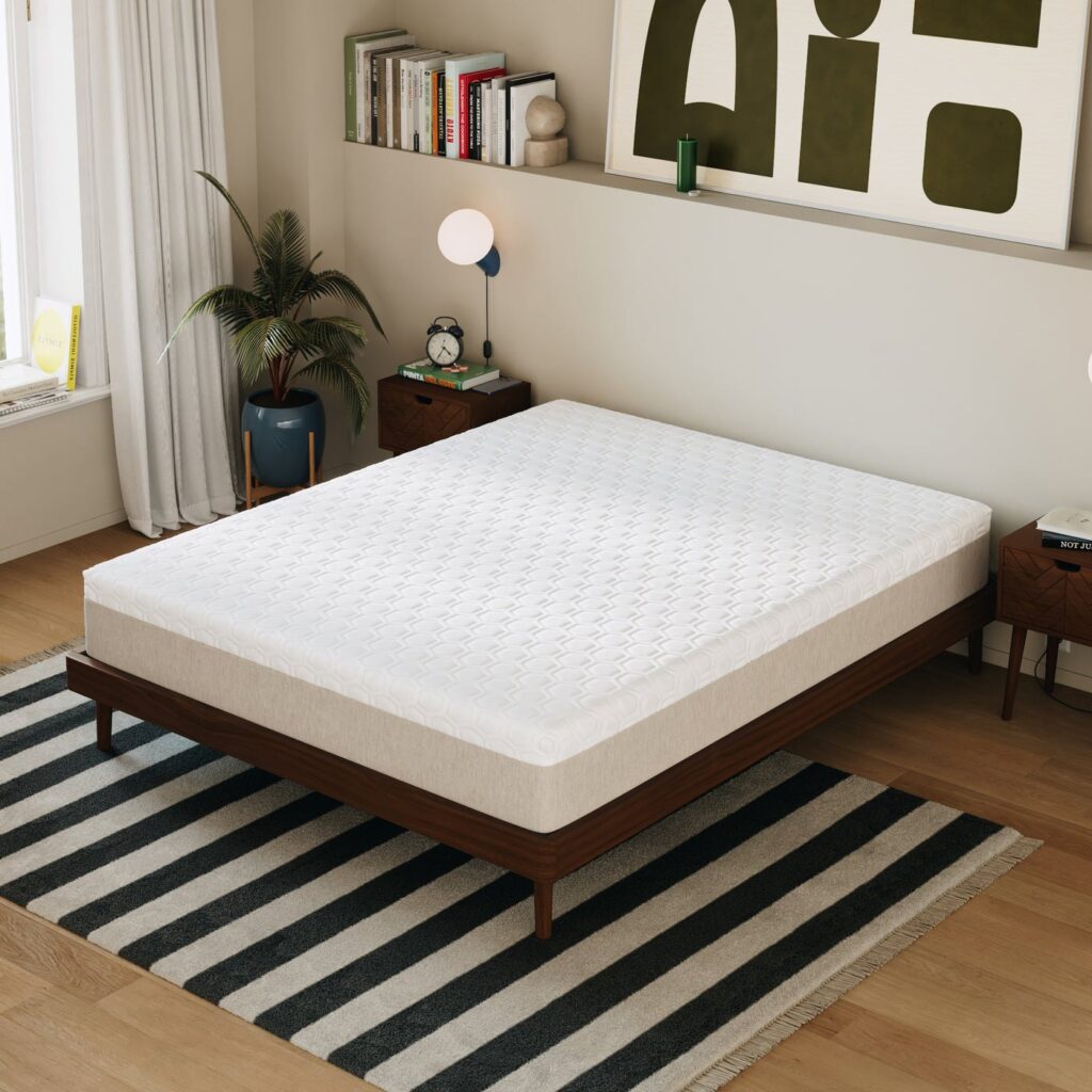 Matelas Hypnia Octaspring sur un lit dans une chambre