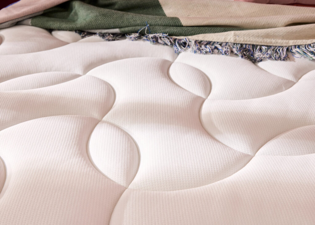 Mérinos Cosy Lit, gros plan sur le matelassage de la face de couchage