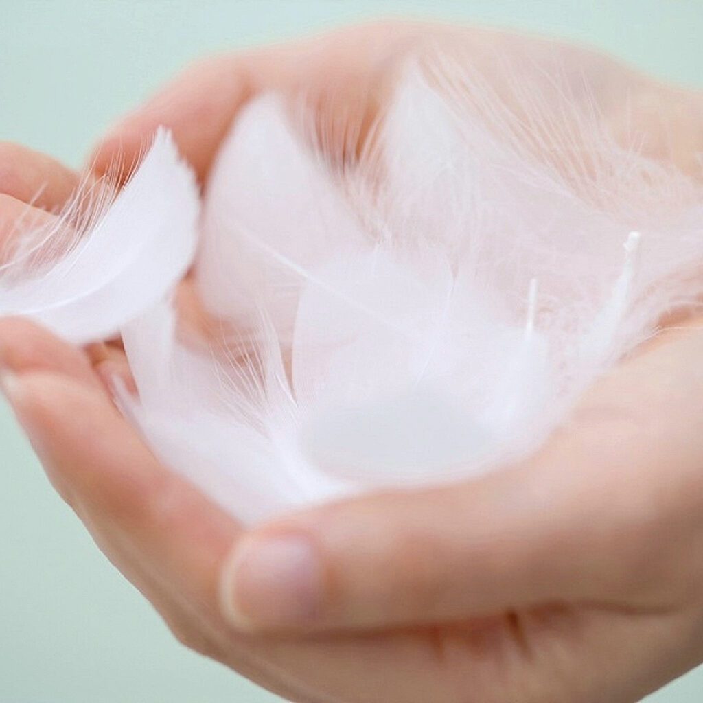 Finition et piqûre de l'oreiller Plumes de la Manufacture Castex