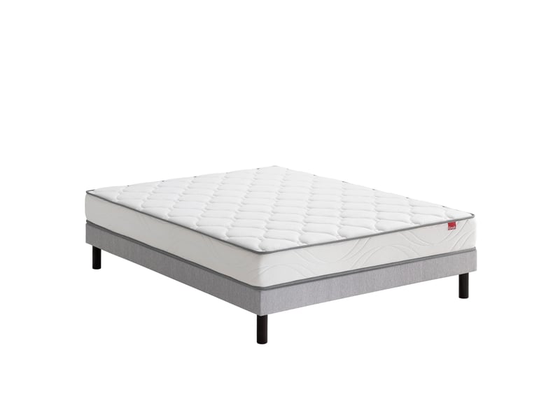 Matelas Épéda L'Esquisse 2 posé sur un sommier gris