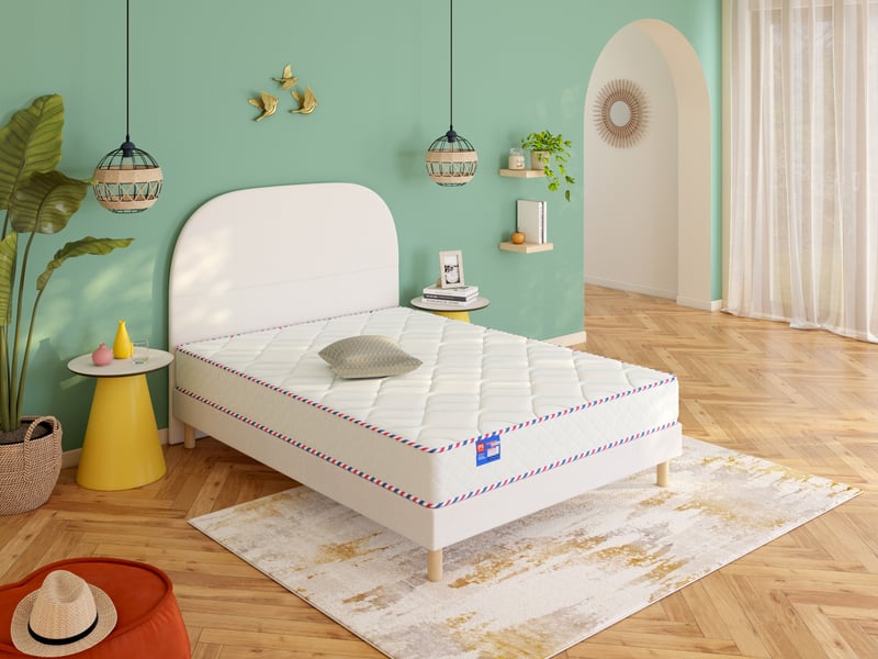 Matelas Mérinos Maman Cool 2 dans une chambre aux murs verts