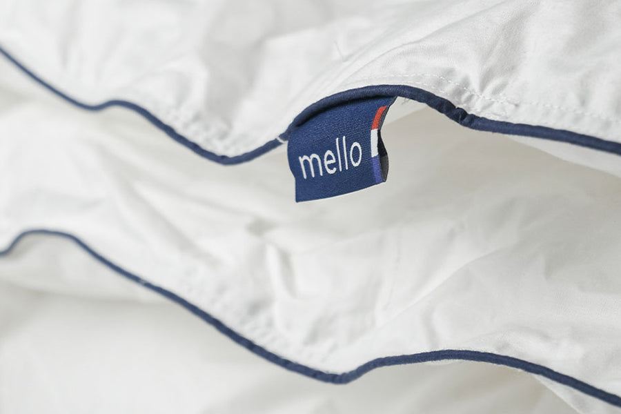 Étiquette Mello et passepoil bleu marine de la couette coton