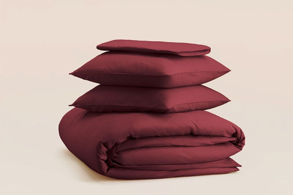 Parure en percale de coton Tediber rouge tanin pliée