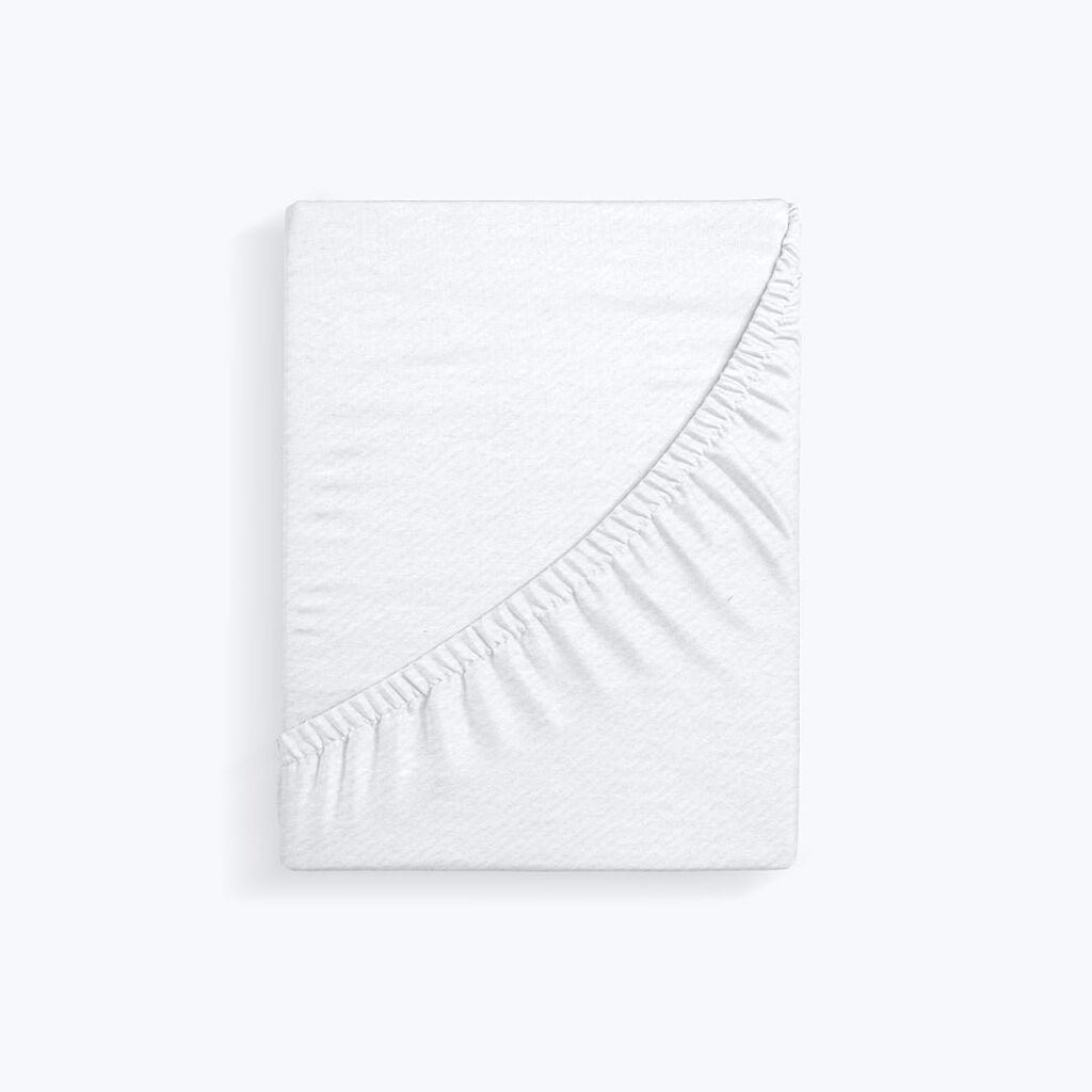 Protège-matelas molletonné Slome à plat, coin à bonnet élastiqué replié