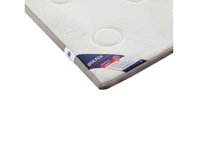 Angle du surmatelas Bultex Memo 5 avec bande latérale et étiquette