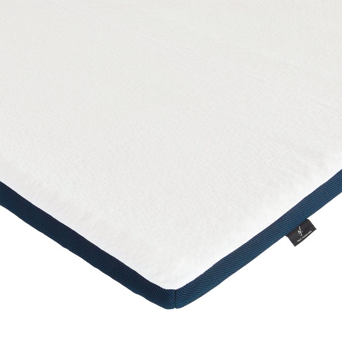 Surmatelas Nuit Faubourg Odéon, gros plan sur l'angle et son liseré bleu
