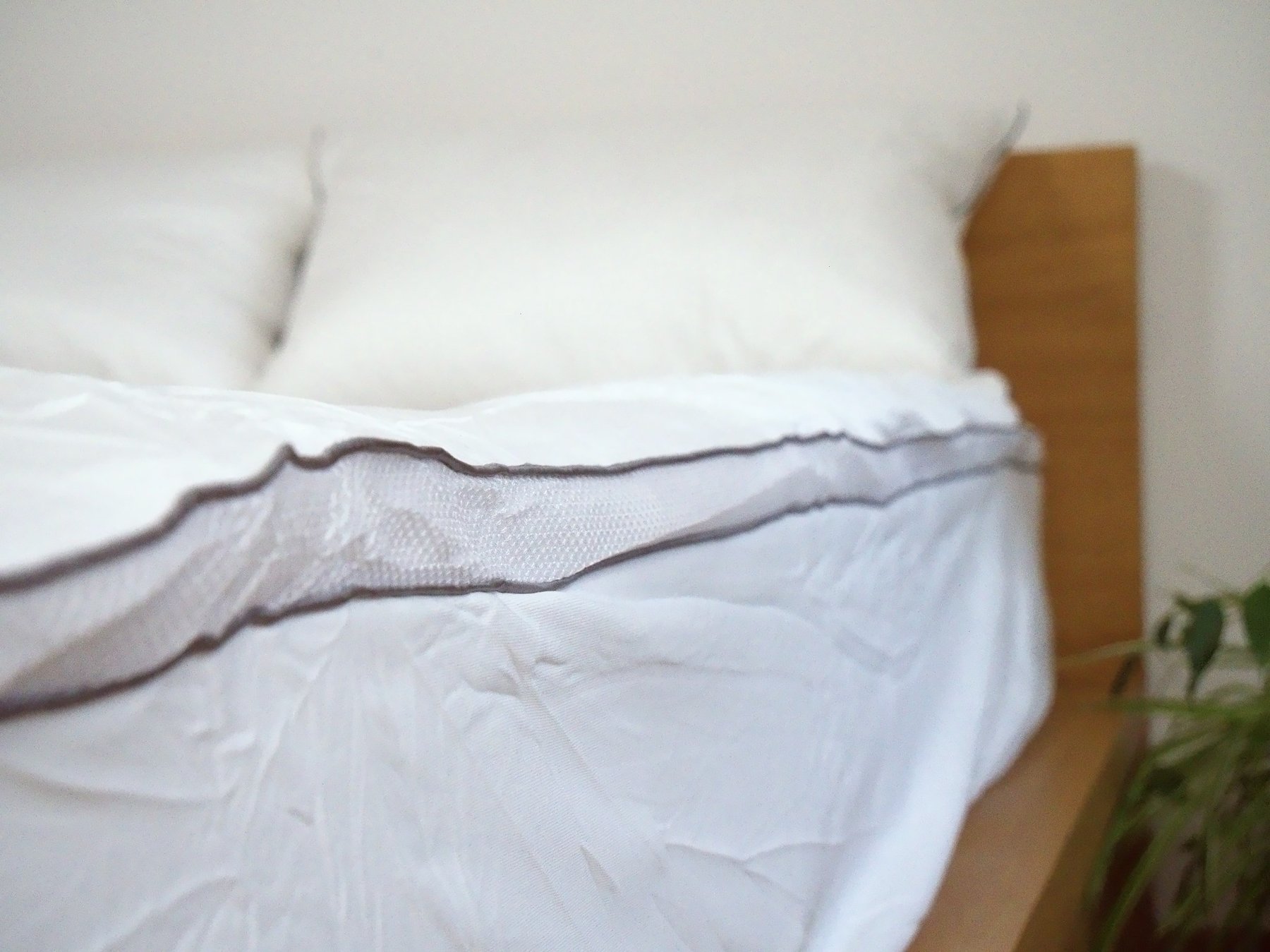 Bonnet de la housse du Mello Duo autour du matelas